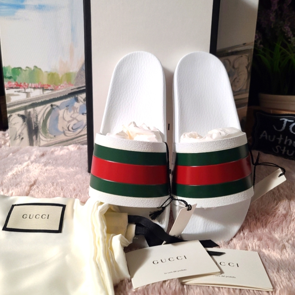 GUCCI Web Lai Rubber Slide sandal for men, available in size 9 and 10.